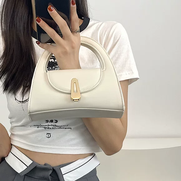 Túi xách nữ mùa hè 2018 mới thời trang phiên bản Hàn Quốc của túi xách không khí hoang dã nữ cá tính túi công sở nữ