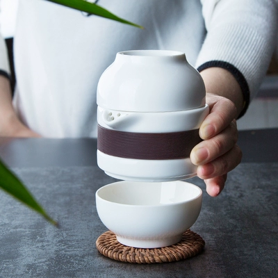 Bộ ấm trà cầm tay du lịch ngoài trời ấm trà tại nhà đơn giản Kung Fu teacup gốm hành khách nhanh cốc một nồi hai cốc