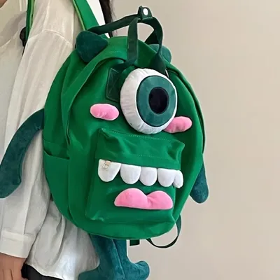 Túi vải canvas dành cho học sinh sức chứa lớn, quái vật một mắt hoạt hình dễ thương, ba lô búp bê nam và nữ đa năng trong khuôn viên trường Nhật Bản