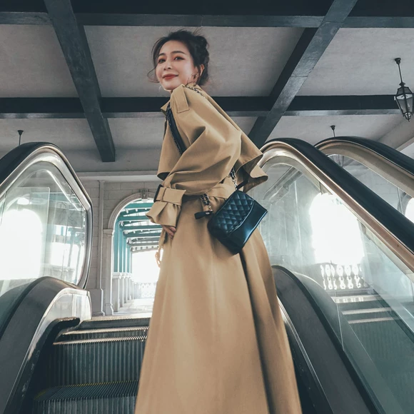 Mùa thu 2019 mới của phụ nữ khí chất ve áo hai dây áo gió dài đoạn bảy điểm tay áo khoác kẻ sọc nữ - Trench Coat áo khoác blazer nữ